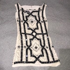 NOWT. Free People white dress with black sequins.